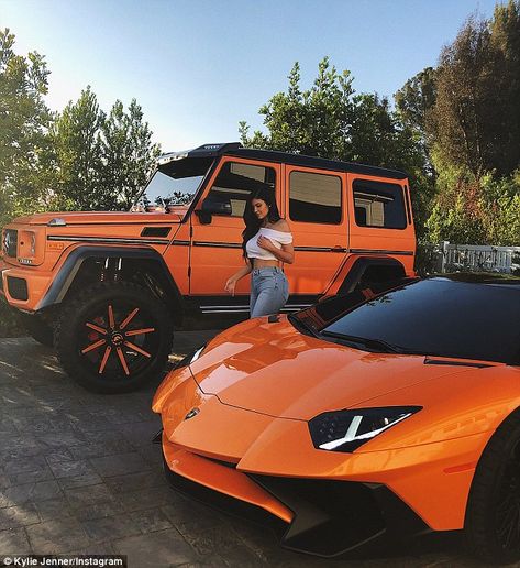 Kylie Jenner poses on her Lamborghini after getting G-Wagon wrapped in matching orange Orange Car, Car Wheels Rims, Lamborghini Veneno, Pagani Huayra, Car Goals, Kris Jenner, G Wagon, Car Wheels, Lamborghini Aventador