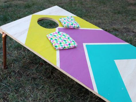 How to Make Designer Cornhole Boards | Decorating and Design Blog | HGTV Cornhole Board Plans, Diy Cornhole, Diy Cornhole Boards, Cornhole Boards Designs, Corn Hole Diy, Diy Paper Bag, Cornhole Designs, Fun Outdoor Games, Cornhole Game