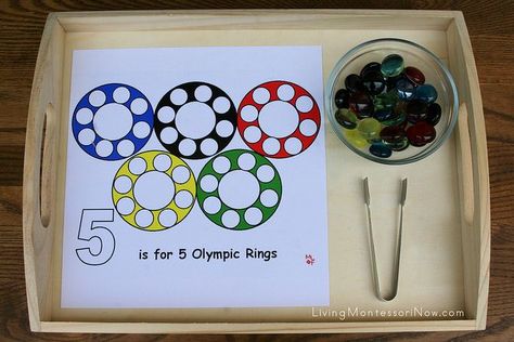 Activity: Use pom-poms to complete the five Olympic rings. You will need: Olympic ring print-out and multi-colored pom-poms. If necessary, follow this link for further directions or alternate material instruction. School Olympics, Summer Olympics Crafts, Summer Olympics Activities, Preschool Olympics, Montessori Math Activities, Olympic Idea, Kids Olympics, Olympic Crafts, Olympics Activities