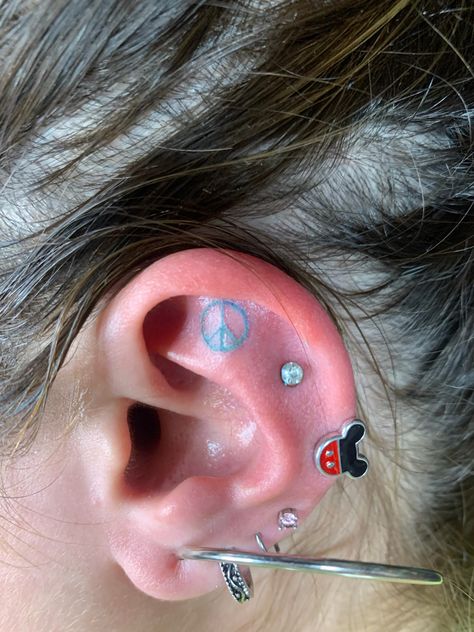 Mini Peace Sign Tattoo, Small Peace Sign Tattoo, Peace Sign Tattoo Behind Ear, Tiny Peace Sign Tattoo, Peace Sign Tattoo, Flower Peace Sign Tattoo, Colorful Peace Sign Tattoo, Peace Sign Tattoos, Cute Tats