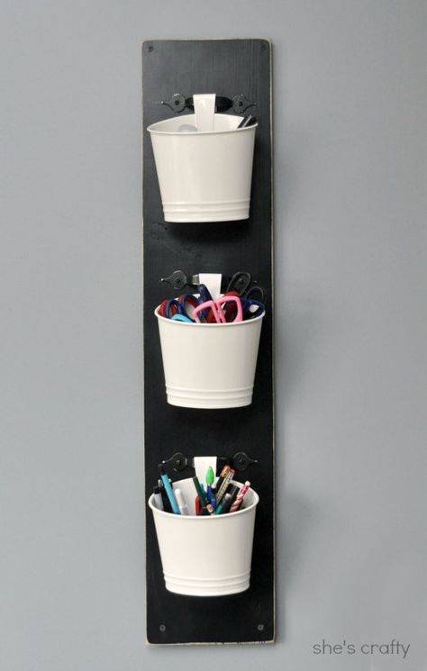 Wall mounted craft tool holder. pails from target, cabinet door handles, and a painted piece of wood. : ) Laundry Room Storage Shelves, Small Laundry Room Organization, Hanging Mason Jars, Marker Storage, Door Shoe Organizer, Tv Bracket, Pen Organization, Small Laundry Room, Laundry Room Storage