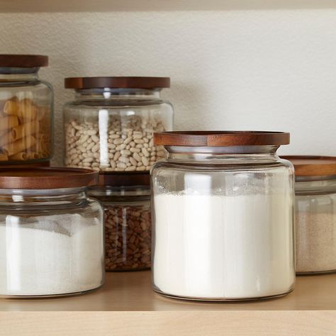 Cute glass food safe containers with wooden lids - perfect for baking supplies! Pantry Remodel, Countertop Storage, Kitchen Pantry Design, Glass Jars With Lids, Pantry Shelf, Glass Canisters, Glass Food Storage, Glass Food Storage Containers, Pantry Design