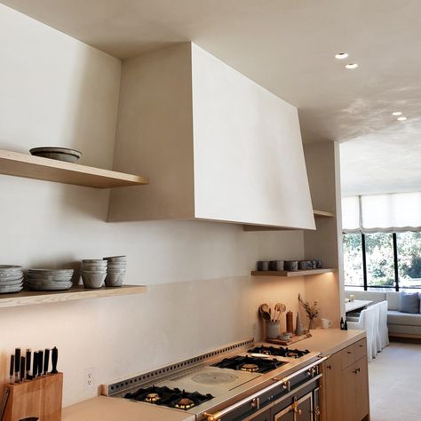 Range hoods expel fumes created during cooking to maintain a healthier air quality indoors. When adding a range hood to your kitchen, consider the benefits of using Vasari's line of eco-friendly finishes. Colors: Alabaster 20 (Lime Paint) #plaster #limepaint #limeplaster #limewash #venetianplastering #designer #luxury #timeless #polishedplaster #takelakt #vasari #decor #plastershower #plasterwalls #organicwalls #interiordecor #design #mineralpaint #santabarbara #miami #newyork #losangeles #... Polished Plaster, Lime Paint, Range Hoods, Plaster Walls, Mineral Paint, Range Hood, Air Quality, Interior Decorating, Miami