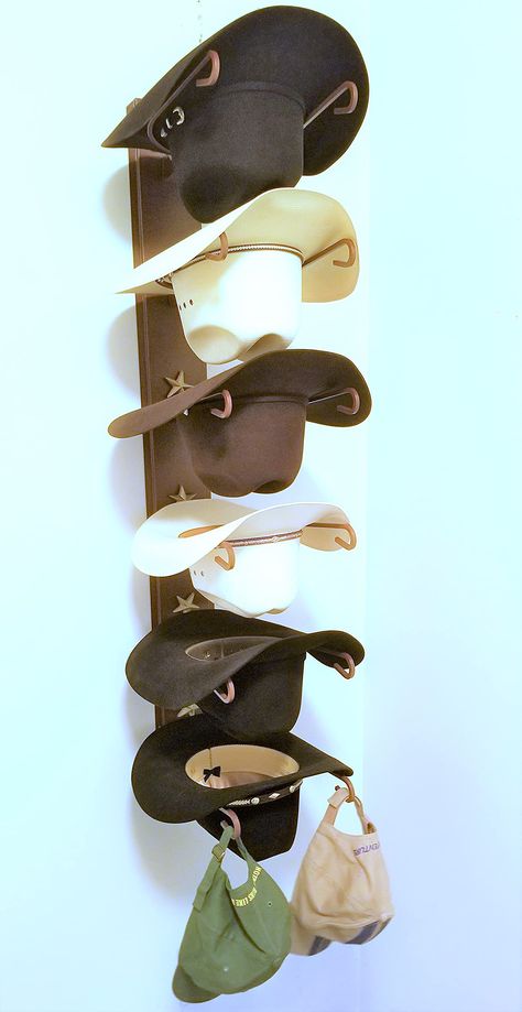 PRICES MAY VARY. Proudly Made in the USA Easily Holds Up To Six Cowboy hats Helps Protect & keep your hats shape Powder coated steel with Gold Stars Decorative and functional You will Love this Cowboy Hat Holder Holds Easily Up to Six Cowboy Hats Designed to Keep Your Hats Shape Looks Great on any wall, the decorative Stars Make this hat rack great Western Wall Art as well. Proudly Made in The USA Hand Finished and Powder Coated Wall Mounting Hardware is included Please note product may vary sli Welded Crafts, Cowboy Hat Holder, Hat Holders, Wall Hat Racks, Cowboy Hat Rack, Hat Racks, Wall Hats, Western Bedroom, Horseshoe Decor