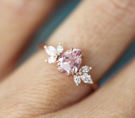 Leandra Pink Ceylon Sapphire Ring With Marquise Diamonds Pear Sapphire Ring, Engagement Ring Pink, Pink Engagement, Peach Sapphire Engagement Ring, Pink Engagement Ring, Pink Sapphire Ring Engagement, Marquise Diamond Ring, Peach Sapphire, Cute Engagement Rings