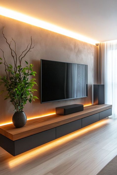 45 Aesthetic Ideas for Decorating Under & Around Your TV Tv Mount Living Room, Tv Mounting Ideas Living Rooms, Mounted Tv With Floating Shelves, Tv Sound Bar Ideas, Floating Entertainment Center Ideas, Living Room Television Wall Ideas, Tv Setup Living Room, 75 Inch Tv On Wall Ideas, Tv Area Ideas Living Room