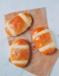 Coconut Buns (Cocktail Buns), 鸡尾包 by thewoksoflife.com Chinese Cocktail, Roast Pork Bun, Coconut Buns, Milk Bread Recipe, Pineapple Bun, Wok Of Life, Woks Of Life, The Woks Of Life, Bread Food