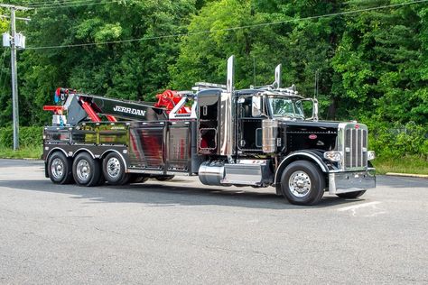 Whether it’s standard lifts or complex rollovers, this Jerr-Dan 50-Ton wrecker delivers best-in-class performance. Paired with a JFB Body, it offers maximum towing power, storage, and organization. The 2023 Peterbilt 389 features a Cummins X15 engine with 565 HP and an Allison 4700RDS transmission. https://ectts.com/Wreckers-Tow-Trucks-Car-Haulers/heavy-wrecker-2023-peterbilt-389-jerr-dan-jbf-50-ton-integrated-heavy-wrecker-in-black-stock14152n/ Heavy Wreckers, All European Countries, Peterbilt 389, Tow Truck, European Countries, Peterbilt, Big Trucks, Cummins, Storage And Organization