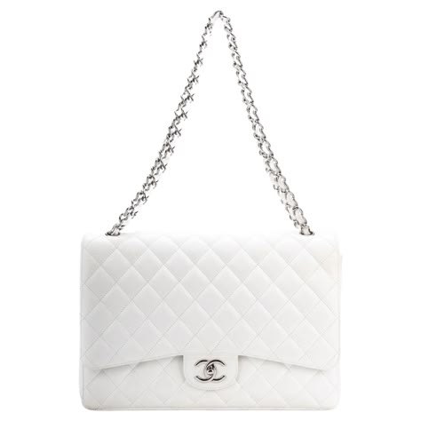 Chanel excellent condition maxi flap in white caviar leather and silver tone hardware. Collection 15. Shoulder drop 11”/19” Comes with hologram and original box. Coco Chanel Bags, Chanel Bag Classic, Trending Handbags, Chanel White, White Purse, Chanel Purse, White Purses, White Handbag, Best Handbags