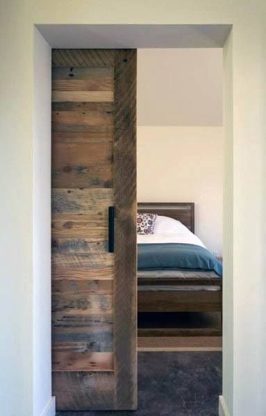 Reclaimed Salvaged Barn Wood Stunning Interior Pocket Door Designs Interior Pocket Doors, Pintu Interior, Backyard Cottage, Aesthetic Bedroom Ideas, Pocket Door, Bedroom Doors, Wood Doors Interior, Interior Barn Doors, Stunning Interiors