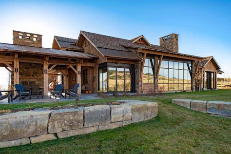 This ranch retreat overlooks a beautiful mountain landscape in Montana Montana Ranch House, Locati Architects, Wyoming House, Vacation Houses, Mountain Home Exterior, Montana Ranch, Rustic Homes, Craftsman Homes, Rustic Exterior