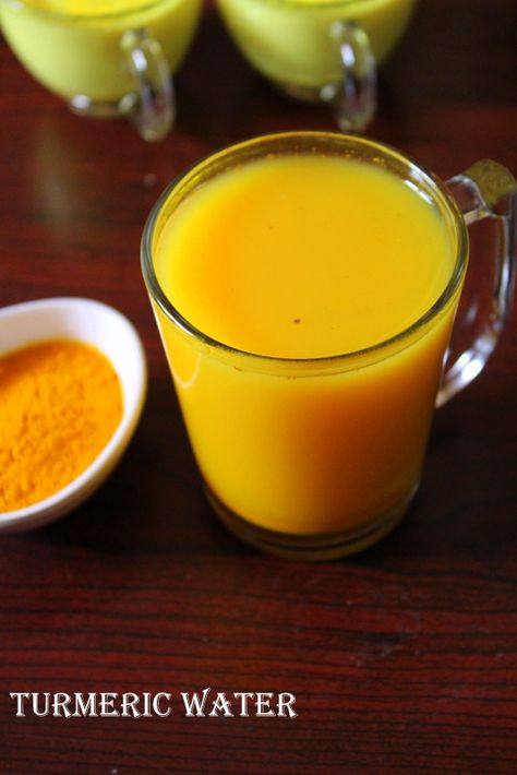 Turmeric water, a detoxifying drink that is highly beneficial if drunk early in the morning as it promotes weight loss as well as flushing out toxins.  #turmericwater #turmericforweightloss #weightloss #beverages Turmeric Water Benefits, Detoxifying Drinks, Turmeric And Pepper, Cumin Water, Turmeric Drink, Tulsi Tea, Turmeric Shots, Turmeric Water, Ginger Water