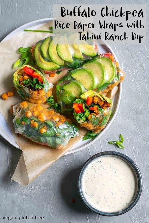 These salad wraps are stuffed with spicy pan roasted buffalo chickpeas, avocado, shredded collard greens, red bell pepper, and fresh herbs. They're rolled up in rice paper then dipped in a tahini ranch dressing, they're the perfect light meal or snack on the go. They're fresh tasting and perfect for summer. | thecuriouschickpea.com #vegan #healthy #glutenfree Tahini Ranch, Chickpea Rice, Rice Paper Recipes, Rice Paper Wraps, Buffalo Chickpea, Rice Wraps, Recipe Paper, Easy Rice, Salad Wraps