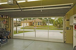 An easy way to turn your garage into a breezy workshop or even a place for the kids to play....i sooooo would really like one of these Garage Screen, Garage Playroom, Garage Screen Door, Garage Boden, Diy Screen Door, Garage Floor Paint, Deco Panel, Garage Remodel, Garage Shed