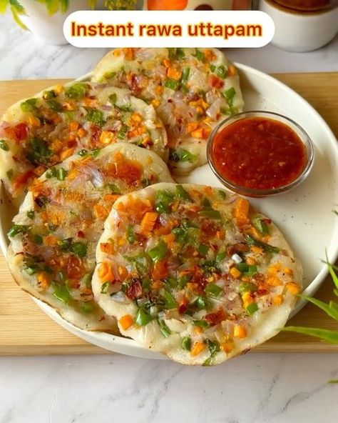 Divya on Instagram: "Instant rawa uttapam recipe😍🔥.  Save this for later❤️.  Ingredients-  🔸Rawa - 1 cup  🔸 Curd - ½ cup  🔸 Salt - 1 TSP  🔸 Water - ½ cup or as required  🔸 Onion - 1  🔸 Tomato -1  🔸 Green chilli - 2-3  🔸 Carrot - ½  🔸 Capsicum - 1  🔸 Coriander leaves - 1 tbsp  🔸 Chilli flakes - 1 TSP  🔸Oil - 2 TSP   Do try this recipe and let me know if you liked it or not 😍😍.  Follow @cookingdiaryathome  For more such amazing content ❤️.  ❌NO REPOST ❌  #reelsinstagram #recipeoftheday #recipereels #breakfastideas #cookingdiaryathome #ranchi #uttapam #easyrecipes #ranchiblogger" Rawa Uttapam Recipe, Idli Sambhar, Uttapam Recipe, Green Chilli, Coriander Leaves, Chilli Flakes, Recipe Of The Day, 1 Cup, Breakfast Recipes