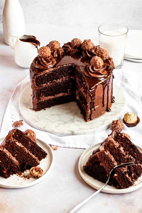 The Most Amazing Ferrero Rocher Cake - Rich And Delish Hazelnut Cake Recipe, Rocher Cake, Ferrero Rocher Cake, Hazelnut Recipes, Chocolate Hazelnut Cake, Hazelnut Cake, Frozen Chocolate, Chocolate Hazelnut Spread, Moist Chocolate Cake