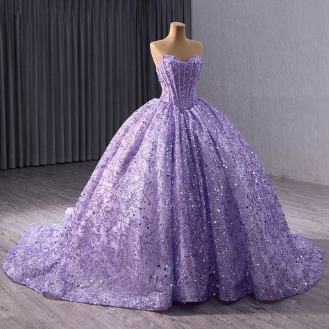 Stunning quinceañera dress in a vibrant purple hue, perfect for a 15th birthday celebration. Features a sweetheart neckline and a sleeveless design for a touch of elegance. Adorned with sparkling embellishments for added glamour and shine. Crafted with high-quality materials for a luxurious and comfortable feel. Flattering fit that enhances the feminine silhouette, creating a regal appearance. Ideal attire for young girls celebrating their quinceañera in style. Elevate the special occasion with Purple Sweet 16 Dresses, Rapunzel Quinceanera, Dresses For 15, 18th Debut, Quinceanera Gowns, Purple Sweet 16, Quince Dresses Purple, 15 Girls, Purple Quinceanera Dresses