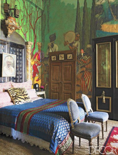 For the master bedroom of her San Antonio, Texas, home, decorator Gwynn Griffith had her son paint a Persian landscape on the walls. Her eye-catching headboard is made from faux-marble pilasters and a pair of Indian pierced-wood doors. Angel Bedroom, Bohemian Style Interior Design, Maximalist Interior Design, Interiors Photography, Bohemian Style Interior, Maximalist Interior, Eclectic Bedroom, Maximalist Decor, Bohemian Bedroom