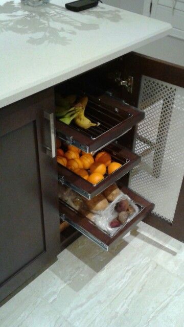 Great idea for storing vegetables. Mesh door and drawers in the kitchen island. Kitchen Cabinet For Vegetables, Kitchen Cabinets Vegetables, Small Kitchen Island Drawers, Vegetable Cabinet Kitchen, Vegetable Racks In Kitchen Cabinets, Vegetables Drawer Kitchen, Vegetable Rack Ideas, Vegetable Drawers Kitchen, Kitchen Onion Potato Storage