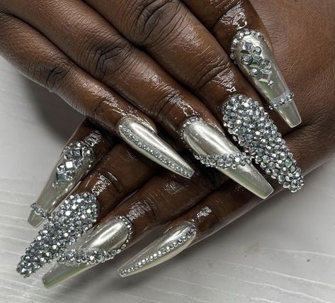 Black And Silver Nails With Gems, Platinum Nail Designs, Silver Chrome And Black Nails, White Chrome Nails With Rhinestones, Silver Nails With Gems, Silver Glam Nails, Silver Nails With Rhinestones, Nail Jewel Design Rhinestones, Silver Glitter Nails Acrylic