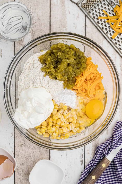 This Cheesy Green Chile Cornbread takes everyday cornbread to the next level with sharp Cheddar cheese, and roasted green chiles! https://www.lanascooking.com/cheesy-green-chile-cornbread/ Cornbread With Chilis And Cheese, Cornbread Recipe With Green Chilis, Cornbread With Cheese And Corn, Chili Relent Cornbread, Green Chili Cheese Corn Spoon Bread, Green Chile Cheese Cornbread, Jiffy Cornbread Recipes Green Chili, Chiles Rellenos Cornbread Recipe, Green Chile Cheese Cornbread Jiffy