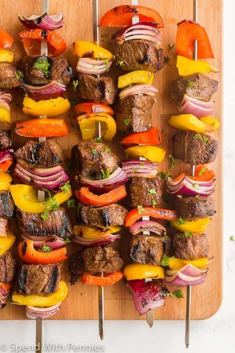 Beef Shish kabobs are a summer staple! Made with sirloin steak tossed in a homemade marinade and threaded onto skewers with your choice of veggies, they are the best grilling recipe. #spendwithpennies #beefshishkabobs #beefskewers #beefkabobs #beef #steak #skewer #grilling #easygrillingrecipes Kabobs Blackstone, Beef Kabobs On The Grill Marinade, Beef Skewers Grill Kabob Recipes, Beef Kabobs In Oven, Beef Kabobs On The Grill, Beef Kebobs, Kebab Marinade, Steak Kabob Marinade, Summer Entertaining Food