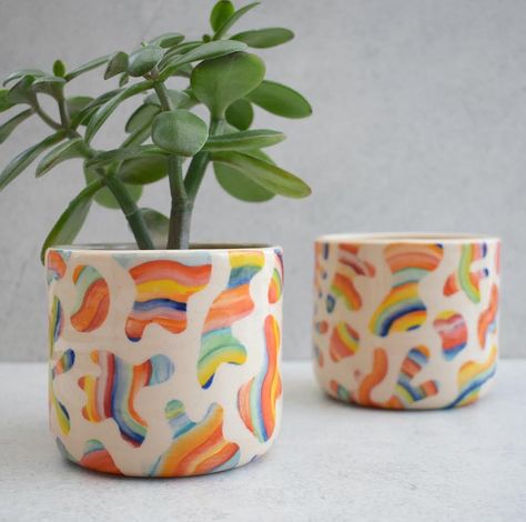 Calling all fellow plant lovers 🪴 🌈 . . . . . #contemporaryart #rainbow #ceramics #pottery #handmade #handthrown #handthrownpottery… | Instagram Ceramic Pottery Bowl, Pottery Painting Plant Pot, Abstract Pottery Painting, Pottery Painting Rainbow, Bright Ceramics, Painted Ceramic Plant Pot, Pottery Painting Inspiration, Colourful Pots, Rainbow Ceramics