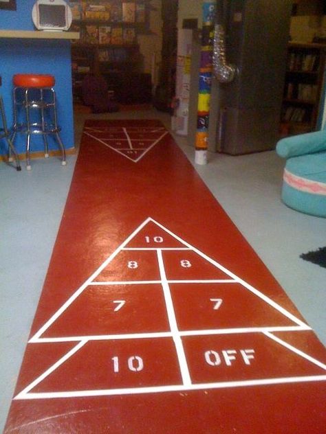 Paint your own shuffleboard court:  http://retrorenovation.com/2010/10/14/how-to-paint-your-own-shuffleboard/ Shuffleboard Court, Lake Accessories, Outdoor Shuffleboard, Lodge Bar, Whiskey Barrel Sink, Concrete Basement Floors, Barrel Sink, Garage Man Cave Ideas, Shot Glass Holder