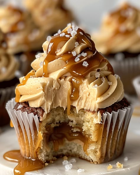 Discover irresistibly gooey salted caramel cupcakes with caramel filling and rich buttercream. A delightful treat for any caramel lover! Christmas Filled Cupcakes, Salted Caramel Cupcakes Recipe, Salted Caramel Cream Cheese Cupcakes, Thanksgiving Cupcake Recipes, Salted Caramel Muffins, Caramel Filling For Cupcakes, Caramel Dessert Ideas, Caramel Filled Cupcakes, Cupcakes With Caramel Filling