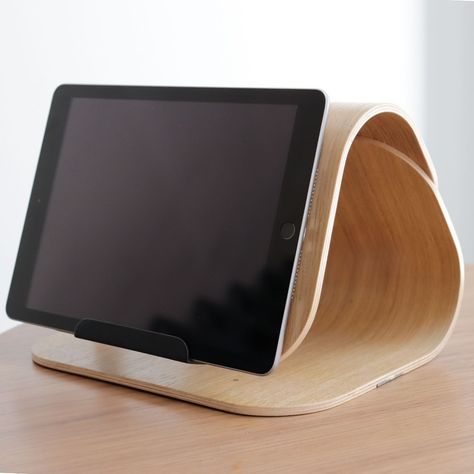 Vacation blues? Refresh your home office with sleek, minimalist plywood designs that bring warmth and style to your workspace. ⁠ ⁠ Crafted from premium fine wood, the PILOT tablet stand is a testament to quality. The unique geometric form ingeniously conceals petite essentials within, transforming it into a chic organiser while effortlessly elevating it into a visual masterpiece.⁠ ⁠ Order it from our webshop with just a few clicks, and we will deliver it to your doorstep (search for the link ... Ipad Stand Wood, Chic Organization, Plywood Design, Ipad Stand, Refresh Your Home, The Pilot, Tablet Stand, Geometric Form, Plywood