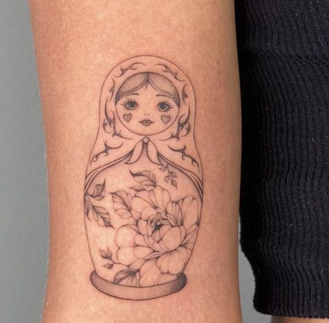 #tattoo #tattoos #inked #tattooart #tattooed #tattooideas #tattoodesign #tattooinspiration #tattoosleeve #tattooflash #inkedgirls #tattooedwomen  #InkLaughs  #TattooFails Babushka Tattoo Small, Russian Doll Tattoo Design, China Doll Tattoo, Babushka Dolls Tattoo, Russian Inspired Tattoos, Babooshka Tattoo, Nesting Dolls Tattoo, Babushka Cat Tattoo, Russian Dolls Tattoo