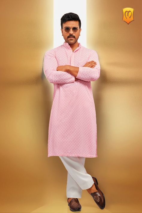 Ram Charan looks dashing in an exquisite flamingo pink kurta set, where traditional Chikankari embroidery seamlessly intertwines with enchanting harlequin patterns, all accentuated by the shimmering sequin work. Get ready to steal the show at any special occasion. Indian Wear For Men, Wedding Dress For Men, Wedding Suits For Men, Mens Indian Wear, Chikankari Embroidery, Kurta For Men, Pink Kurta, Ram Charan, Harlequin Pattern