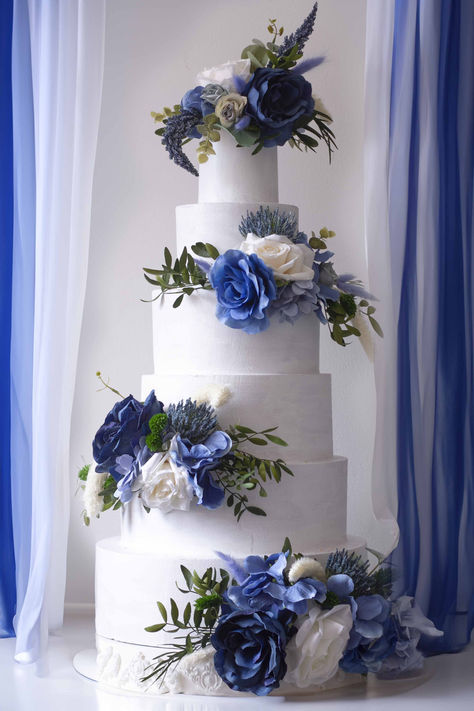 Enhance your wedding cake with our Stunning Royal & Dark Blue Floral Cake Topper Set. This impressive 4-piece floral arrangement is designed to elevate your cake with striking dark and royal blue tones, perfect for adding sophistication and style to any wedding or special occasion. Crafted from high-quality artificial flowers, this set offers a luxurious look that will captivate your guests and complement a wide range of wedding themes, from classic and elegant to bold and modern. Royal Blue Wedding Cake Ideas, White And Navy Wedding Cake, Royal Blue And White Wedding Cake, Sapphire Wedding Theme, Royal Blue Wedding Cake, Blue Floral Cake, Navy Blue Wedding Cake, Royal Blue Wedding Cakes, Royal Blue Cake