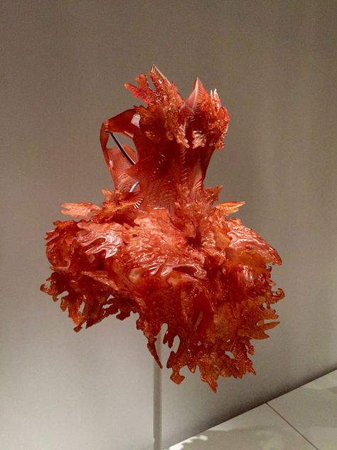 Iris van Herpen DRESS, Autumn 2012, haute couture 3-D-printed (stereolithography) dark orange epoxy by Materialise, hand-sanded and hand-sprayed with a technical transparent resin Van Herpen Dress, Manus X Machina Fashion, Iris Van Herpen Couture, Manus X Machina, Boston Interior Design, Sculptural Fashion, Iris Van Herpen, Transparent Resin, Chihuly