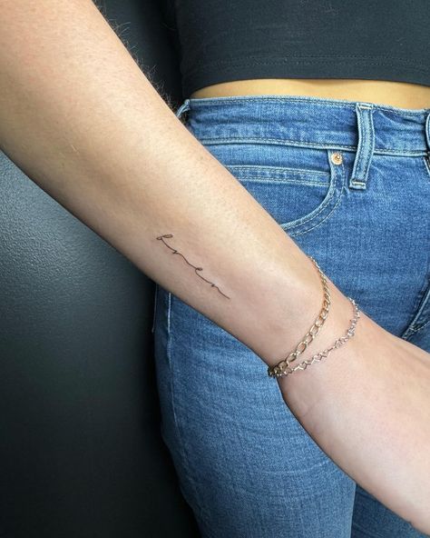 Fine line tattoo, tiny tattoo, small tattoo, script tattoo, cursive tattoo Fine Line Cursive Tattoo, Last Name Tattoo For Women, Above Elbow Tattoos For Women, Side Of Wrist Tattoo, Fine Line Script Tattoo, Script Tattoo Placement, Tattoo Cursive, Above Elbow Tattoo, Cursive Tattoo