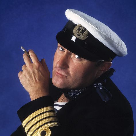 Phil Collins. English drummer, singer, songwriter and actor Phil Collins, photographed in the USA, 1994.  Photographer: Gered Mankowitz.    #PhilCollins #English #drummer #singer #songwriter #actor #photography #nautical #USA #1994 #Photographer #GeredMankowitz #photo #celebrity #famous #songs Gered Mankowitz, Actor Photography, Famous Songs, Iconic Images, Phil Collins, Singer Songwriter, Songwriting, Captain Hat, Nautical