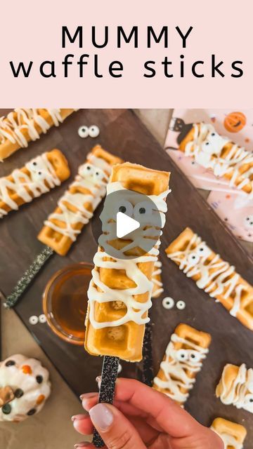 Leanna Laming on Instagram: "MUMMY WAFFLE STICKS👻   Get into the Halloween spirit with these adorable mummy waffle sticks! Perfect for a spooky breakfast treat, these Belgian waffles are turned into cute mummy’s with a piping of white chocolate and candy eyes. 🧇🍬   Comment MUMMY and I’ll send you the directions and everything you need!   #halloweenrecipes #fallrecipes #cookingvideo #quickrecipes #recipeideas #easymeals #recipevideo #goodmoodfood #easyrecipes #foodie #foodphotography #foodreelsfoodblogger #instafood #betterhomesandgardens #mybhg #mybhghome #bhghowiholiday #bhgholiday  #foodreels  #ltkhome" Halloween Waffles For Kids, Halloween French Toast, Halloween Waffles, Diy Waffle Bar, Spooky Breakfast, Halloween Morning, Waffle Pops, Cute Mummy, Waffle Sticks