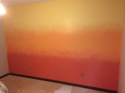 Master two variations with simple instructions from the pros Multi Room Ideas, Rainbow Paint Wall, Ombre Striped Wall, Pink Ombre Wall Paint, Ombre Rainbow Wall, Sunrise Ombre Wall, Orange Ombre Wall, Pink Ombre Wall Paint Diy, Ombre Painted Walls