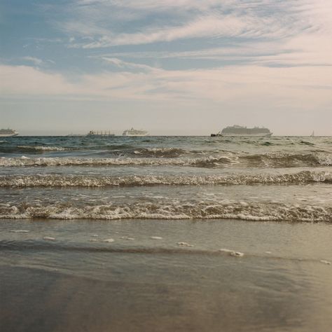 Step back in time with this vintage-inspired film photograph capturing the timeless beauty of Long Beach, California. Shot on film, this nostalgic image showcases the tranquil rhythm of the waves caressing the sandy shores, while boats gracefully adorn the distant horizon. With its dreamy hues and retro charm, this photograph evokes a sense of nostalgia and serenity, perfect for adding a touch of coastal elegance to any space. *This is a digital download* *Frame is not included* Keywords: Long Beach California, vintage photograph, film photography, beach waves, boats on water, coastal decor, retro beach print, coastal photography, vintage California art, beach wall art. Vintage Ocean Aesthetic, Grainy Beach Aesthetic, California Beach Aesthetic Vintage, Serenity Aesthetic, Beach On Film Aesthetic, Beach Film, Freetime Activities, Vintage Long Beach California, Coastal Photography