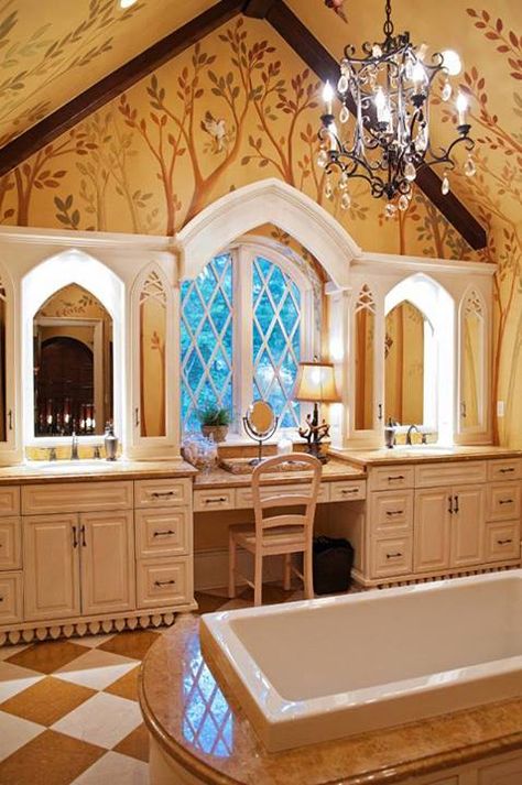 This is the Master Bedroom Bath of the custom Storybook Homes Design. It features a stand-alone tub with marble surround, twin vanities with gothic arch topped mirrors, and a makeup bar at the casement windows. Whimsical House, Witches House, Storybook House, Fairytale House, Stand Alone Tub, Storybook Homes, Fairytale Cottage, Storybook Cottage, Cottage Interior