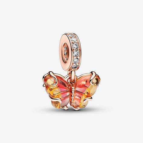 Transform into your best self with the Pink & Yellow Murano Glass Butterfly Dangle Charm. This 14k rose gold-plated charm features Murano glass wings in an orange-and-pink gradient with a cut-out pattern on the back that shows through the glass, and 14k rose gold swirls on the front. Microbeads on the butterfly's body and pavé on the bail add a touch of delicate sparkle. Add this bright butterfly to your look as a powerful symbol of transformation and new beginnings. - Pandora Pink & Yellow Mura Pandora Pink, Pandora Rose, Charms Pandora, Bracelet Pandora, Disney Classics, Glass Butterfly, Bracelet Charms, Pandora Bracelet Charms, Butterfly Charm