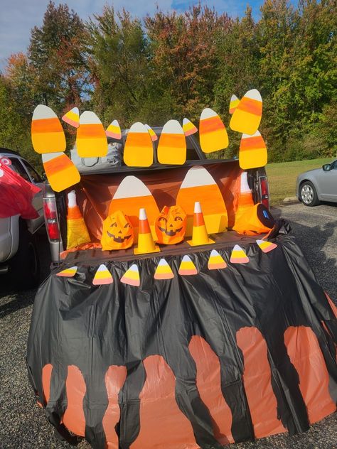 Easy dollar tree items for an inexpensive, candy corn themed trunk or treat. Candy Corn Trunk Or Treat, Candy Corn Theme Trunk Or Treat, Easy Candyland Trunk Or Treat, Fun Trick Or Treat Candy Ideas, Halloween Candy Chute Ideas, Candy Land Trick Or Trunk, Trunk Or Treat, Candy Shop, Candy Corn