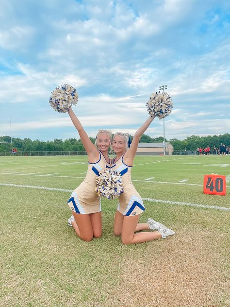 Buddy Cheer Poses, Football Cheer Pictures Team Photos, Fnl Picture Ideas Cheer, 3 Person Cheer Poses, Cheerleading Poses 2 People, Sister Cheer Pictures, Cheer Tattoos Cheerleading, Cheer Buddy Pictures, 2 Person Cheer Poses