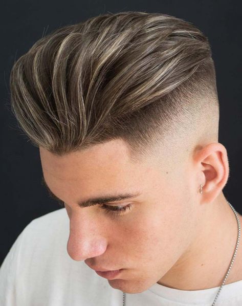 Disconnected Finger Comped Pomp - This pompadour takes many of the techniques we’ve already discussed (finger combing, a skin fade, and a disconnect) and gracefully blends them into one look. Mens Haircuts Medium, Mens Hairstyles Fade, Pompadour Hairstyle, Medium Length Hair Men, Men Haircut Styles, Cool Hairstyles For Men, Corte De Cabelo Masculino, Undercut Hairstyles