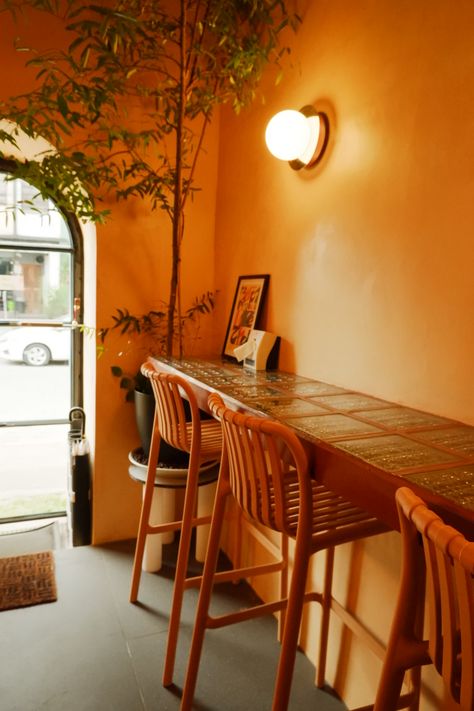 Orange Coffee Shop, Orange Cafe, Mexican Bakery, Local Cafe, Orange Coffee, Coffee Shop Aesthetic, Coffee Books, Orange Wood, Interior Design Color