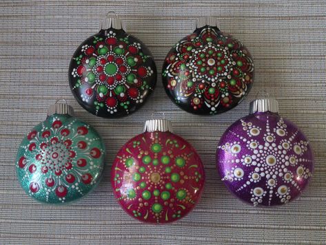 Each ornament is different. They start with a center dot and progress from there.  Mandalas are known for their calming, meditative properties and much more.  These would be an excellent addition to your Holiday decoration collection. Give as a memorial gift for someone you love or care about. Or just for yourself.  Lovely to look at and a keepsake for sure.  They are painted on a shatterproof ornament disc Thank you for visiting my shop.  Come back soon. Painted Christmas Decor, Christmas Mandalas, Mandala Paint, Mandala Ornaments, Handpainted Christmas Ornaments, Christmas Mandala, Dot Mandalas, Wreath Ornament, Bauble Ornaments