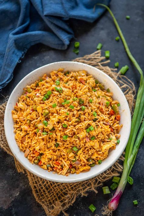 Spicy Indo Chinese Schezwan Egg Fried Rice Recipe is a delicious Chinese style spicy rice preparation which is very easy to make at home. #IndoChinese #RiceDish #Rice Recipe Spicy Fried Rice Recipe, Egg Fried Rice Recipe Easy, Fried Rice Recipe Indian, Spicy Fried Rice, Chinese Egg Fried Rice, Egg Fried Rice Recipe, Fried Rice Recipe Easy, Spicy Eggs, Chinese Egg