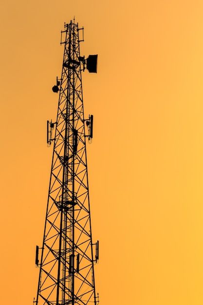 Photo silhouette of communication tower ... | Premium Photo #Freepik #photo #cell-tower #mobile-tower #telecommunication-tower #network-tower Cell Tower Drawing, Network Aesthetic, Milad Tower Wallpaper, Control Tower Illustration, Mobile Tower, Communication Tower, Tower Climber, Street Background, Diwali Photography