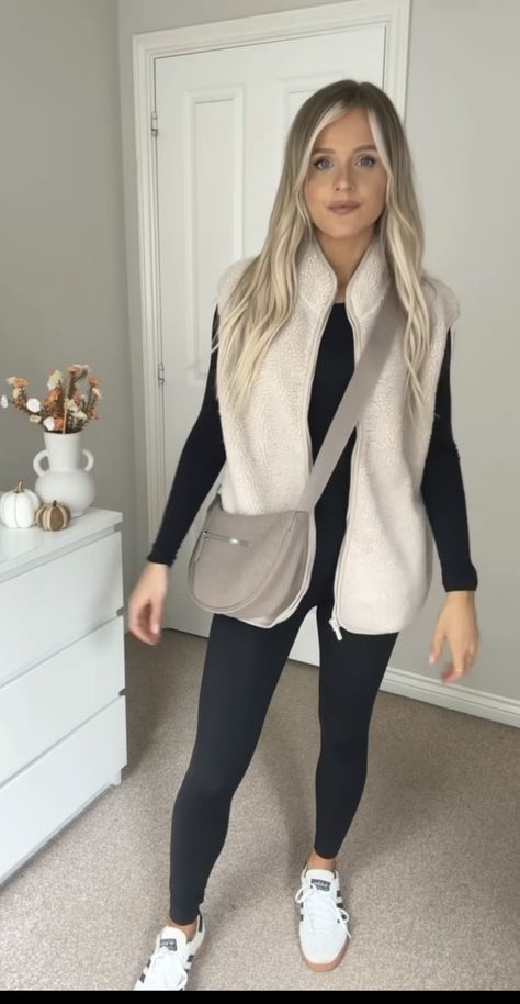 Grey Gilet Outfit Women, Cream Sherpa Vest Outfit, White Fluffy Vest Outfit, Teddy Vest Outfits For Women, White Fuzzy Vest Outfit, White Sherpa Vest Outfit, Black Fleece Vest Outfit, White Fleece Vest Outfit, Cream Gilet Outfit