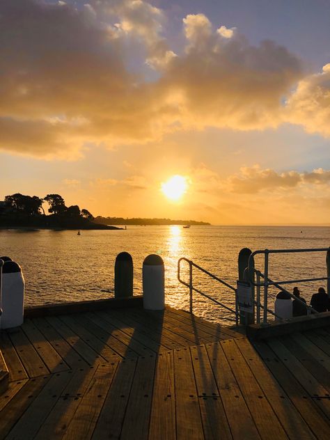 View of sun setting in the distance from the wooden pier in Cowes, Phillip Island Phillip Island, Island Sunset, Rich People, Sunset Views, 2024 Vision, Summer Vibes, Vision Board, Australia, Travel